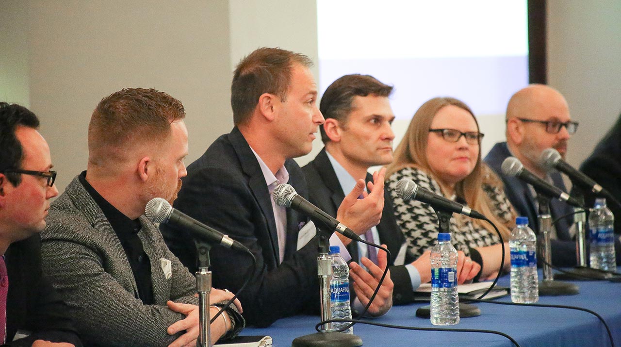 A panel discussion featuring business professionals