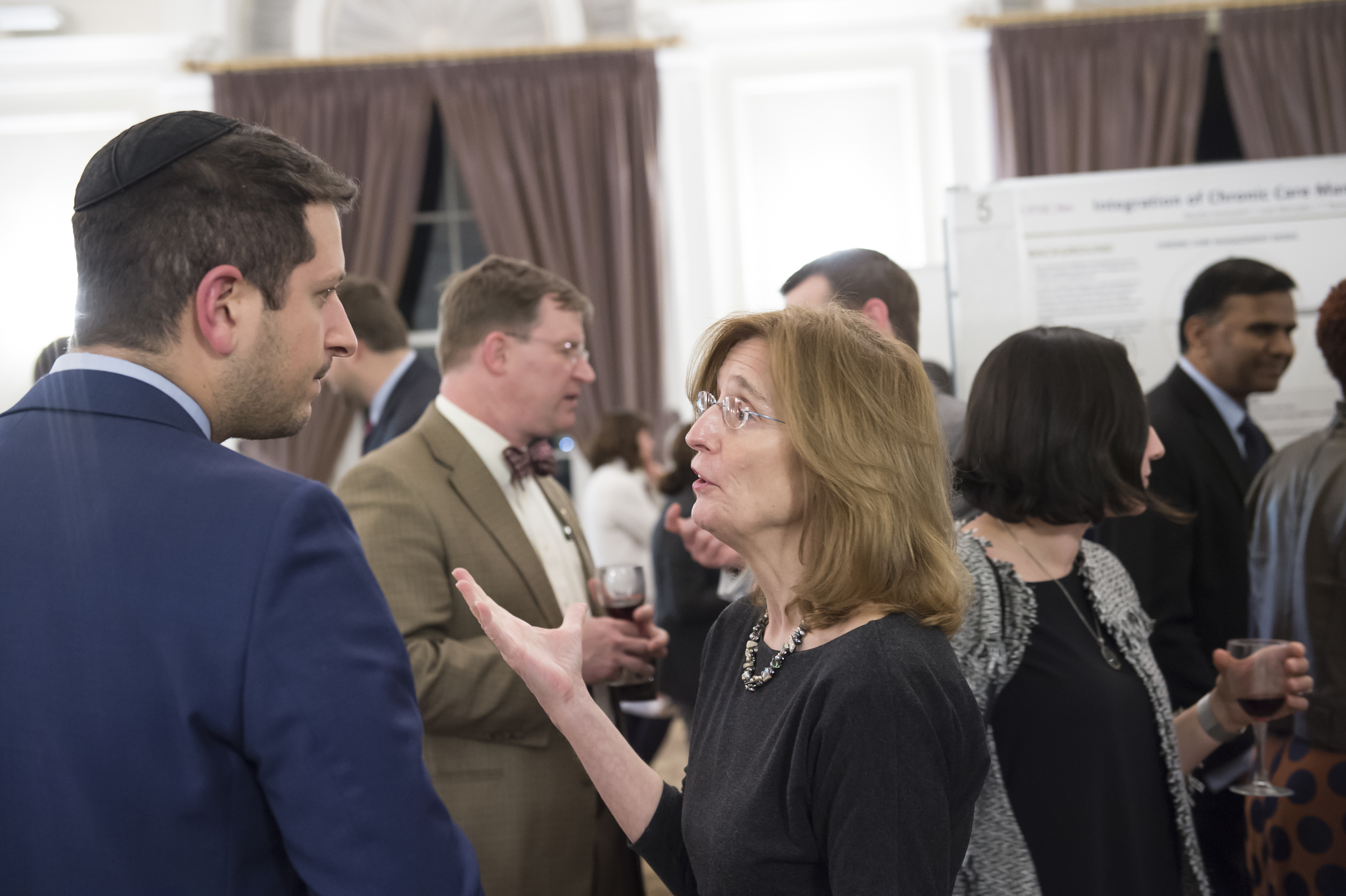 Group of students presenting a project to a crowd