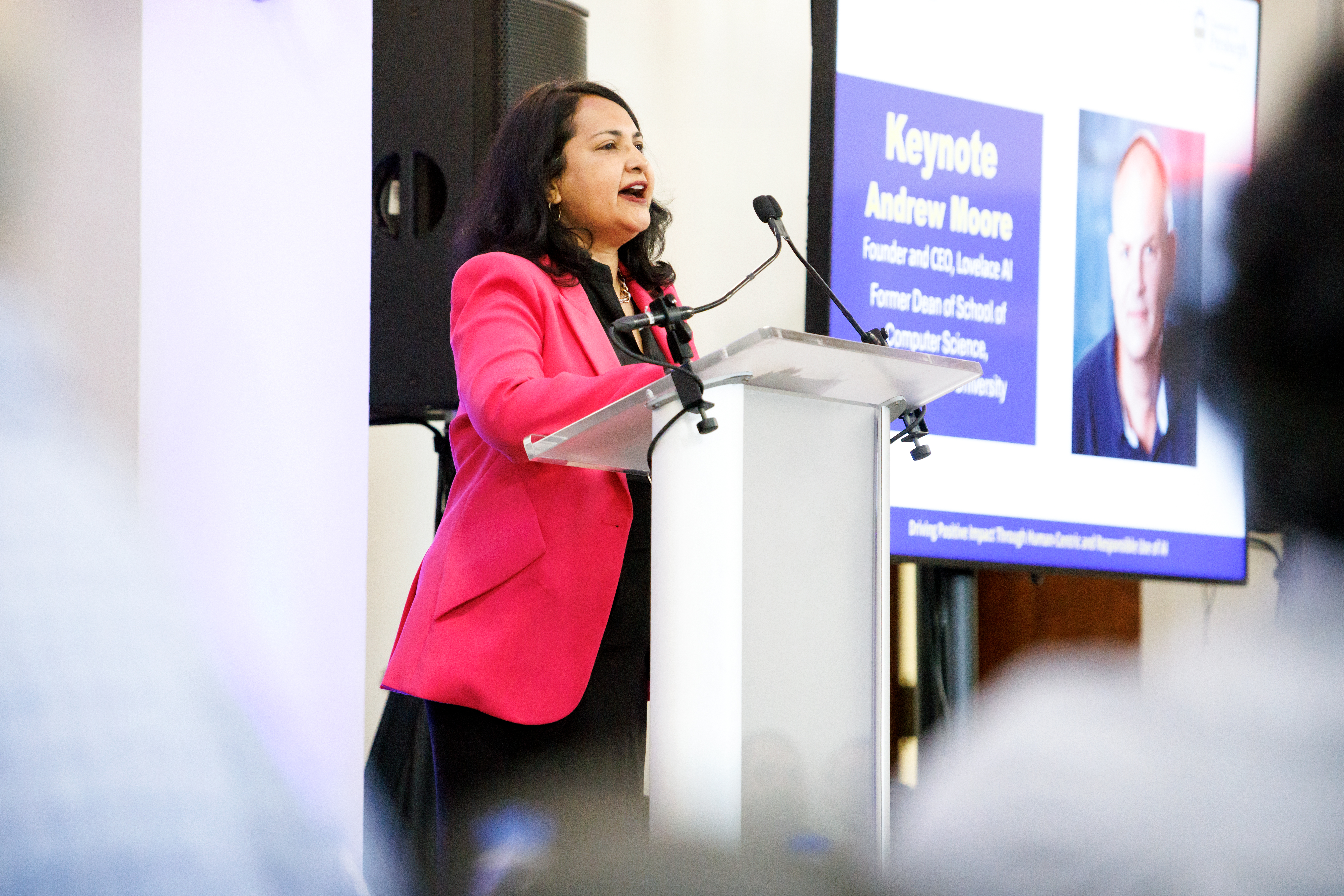 A group of students having a discussion in a team room